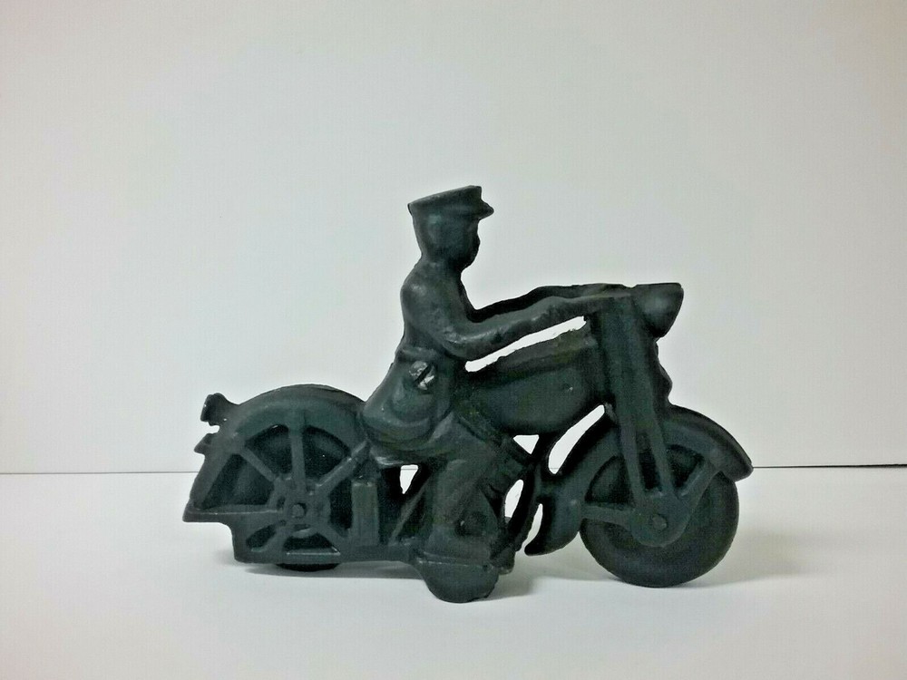 Cast iron POLICEMAN on motorcycle MOVING WHEELS