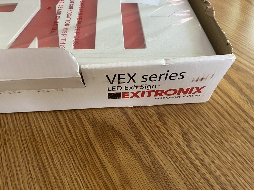 EXITRONIX LED EXIT SIGN w/ BATTERY BACKUP VEX-U-BP-WB-WH NEW! $40