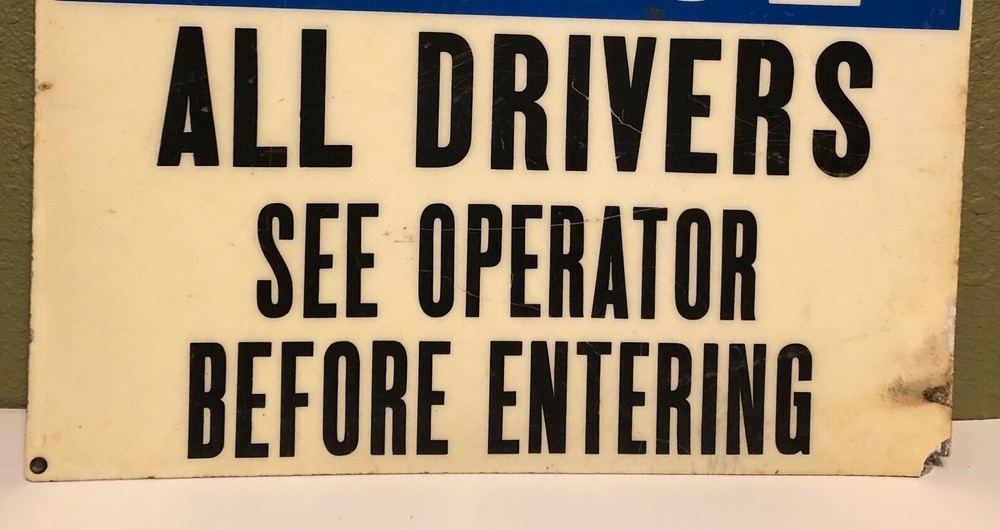 Vintage "NOTICE ALL DRIVERS SEE OPERATOR BEFORE ENTERING" LAMINATED SIGN