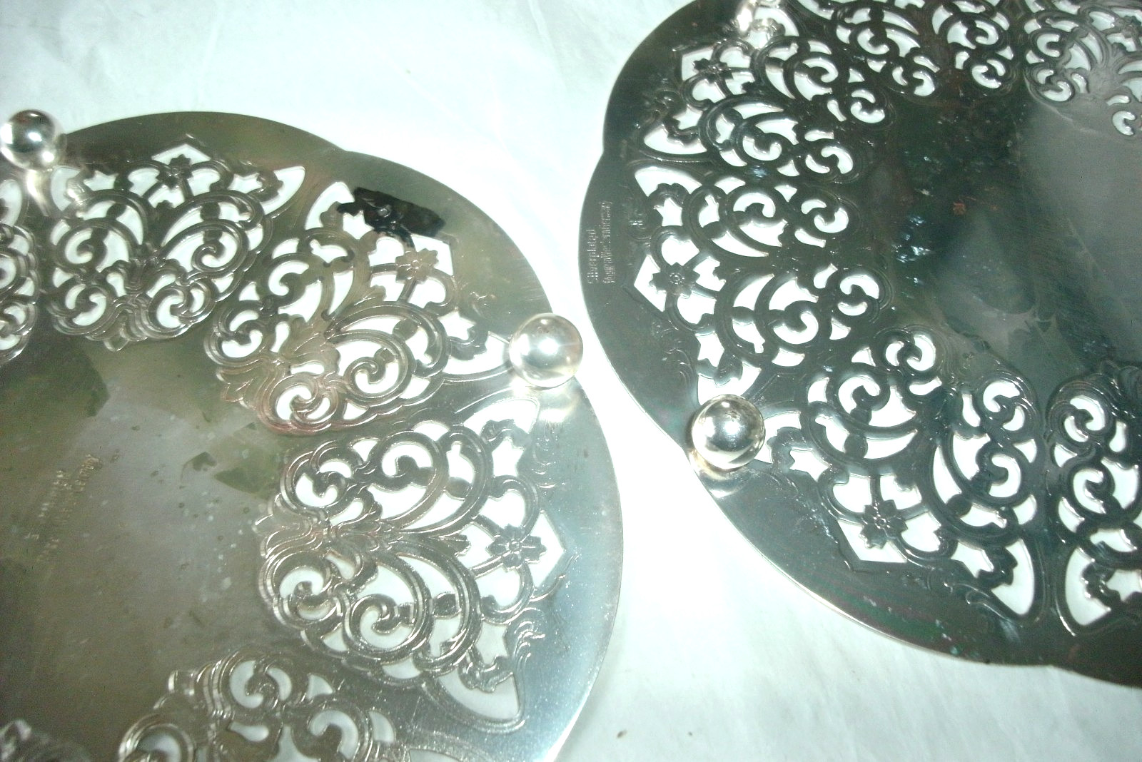 2 VINTAGE FOOTED SILVERPLATE TRIVETS, MADE IN WESTERN GERMANY, 6"