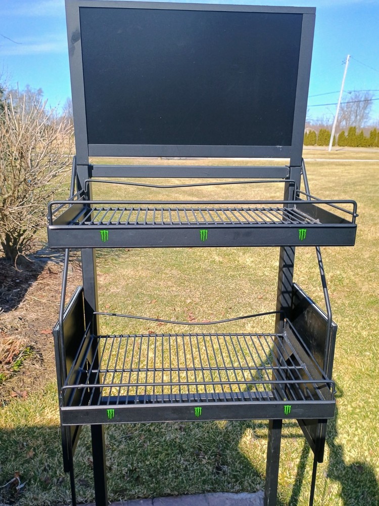 Monster Energy drinks display shelf on wheels that lock and with inserts