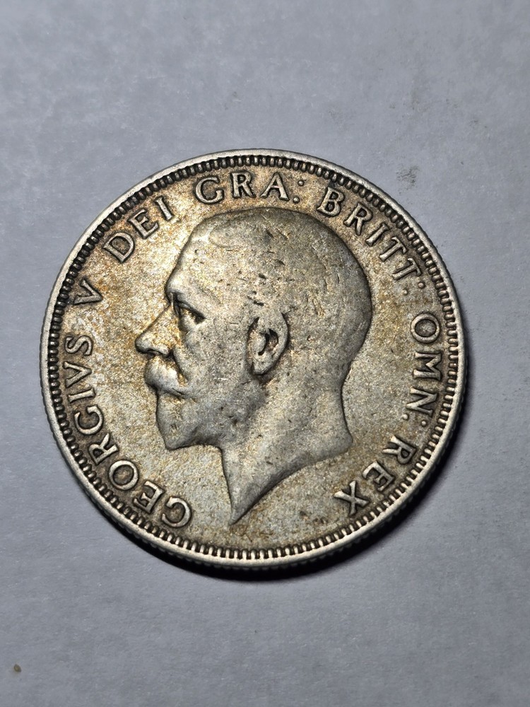 British sixpence (often called a "tanner")