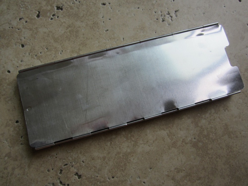 Aluminum folding stove windscreen for backpacking