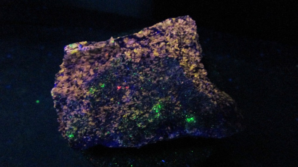 Orange Fluorescent mineral rock T26
