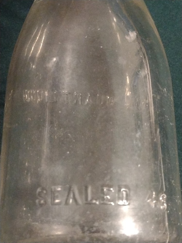 Antique dairy bottle ONE QUART LIQUID