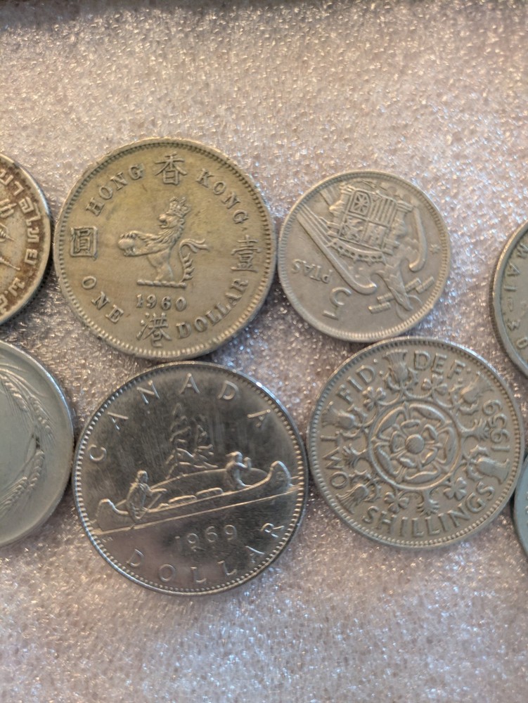 10 misc vintage foreign coins