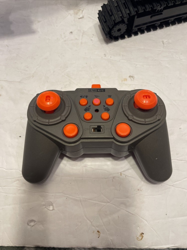Coplus Remote Control Back Loader. Works great. No charger for tractor itself ￼