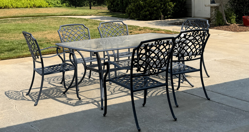 Outdoor Patio Dining Set: Solid Wrought Iron glass table with 6 chairs