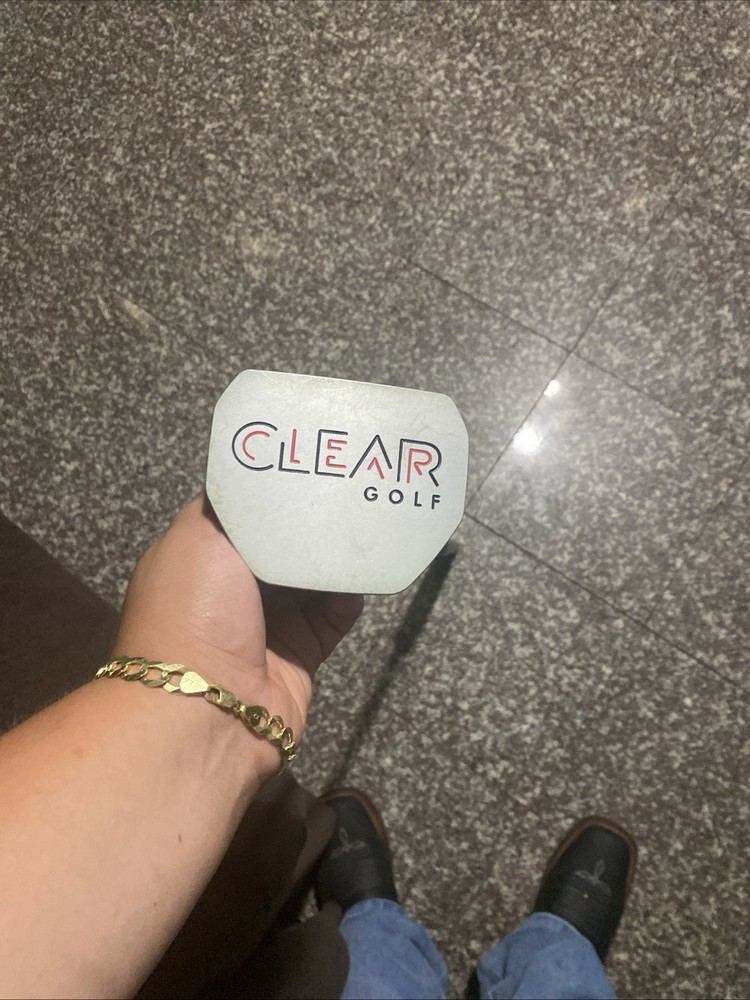 It’s A Clear Golf Putter Supper Clean It has It’s Cover For The Putter