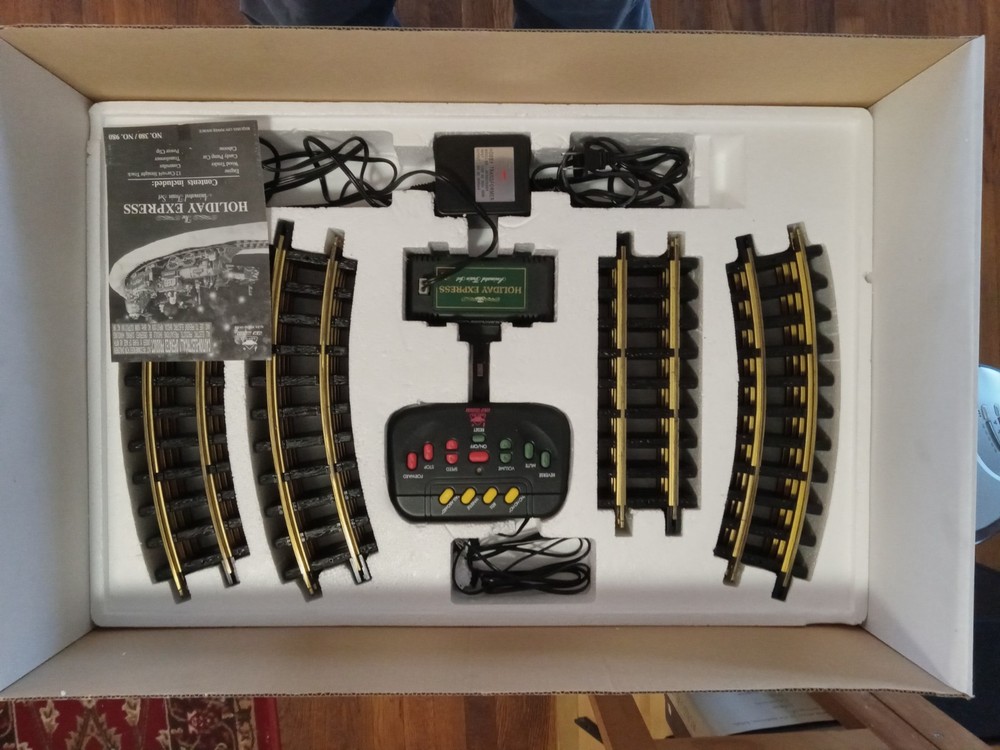 The Holiday Express Animated Train Set. Complete working set plus 2 extra cars.