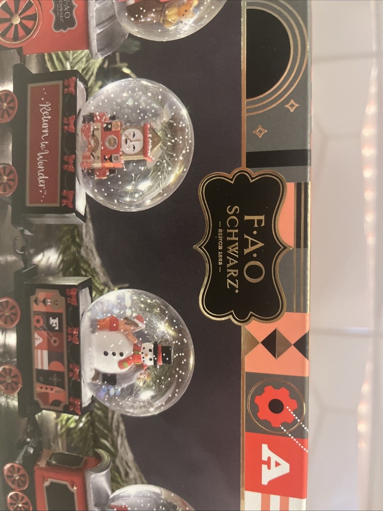 F.A.O SCHWARZ 4- piece Train Snow Globe Set