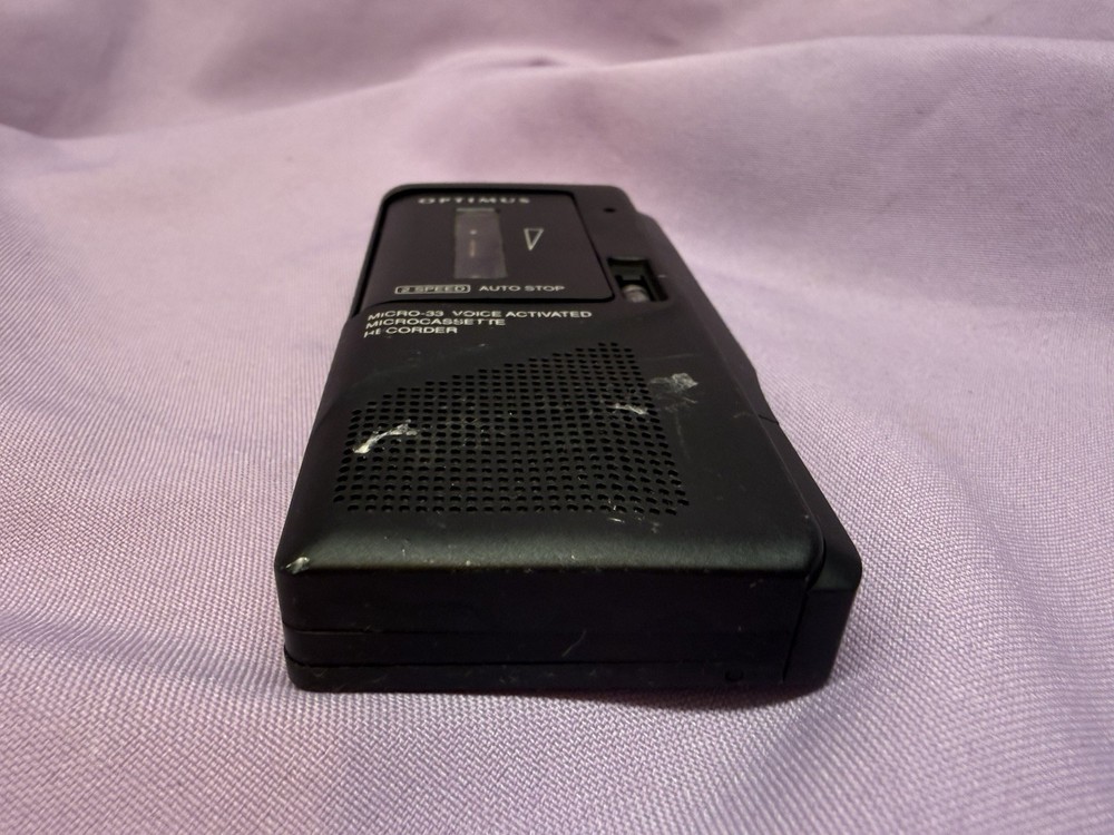 Optimus Micro-33 Voice Activated Microcassette Recorder. Not Tested.