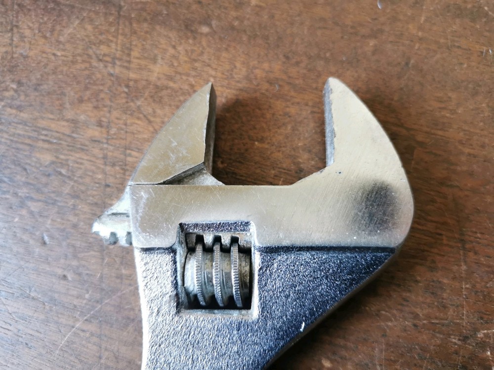 Modern 10" Adjustable Spanner to clear, no makers name.