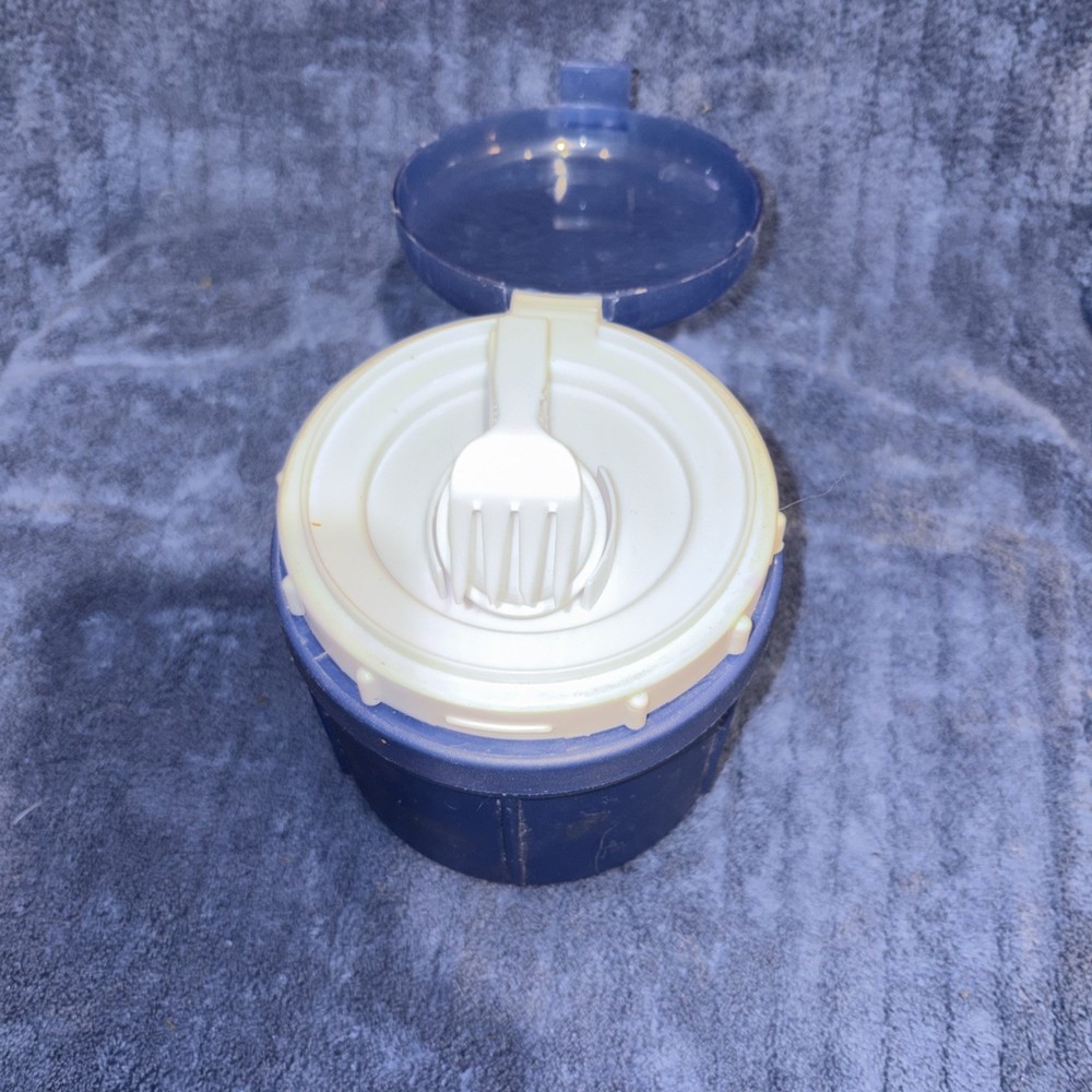 Insulated Food Storage Container With Folding Spoon And Fork
