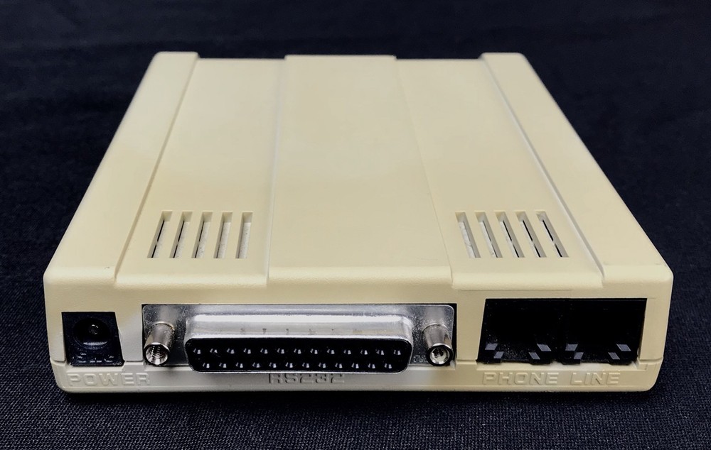 Used MultiTech Light Gray MTZ2834ZDX External 33.6K Data/Fax Modem