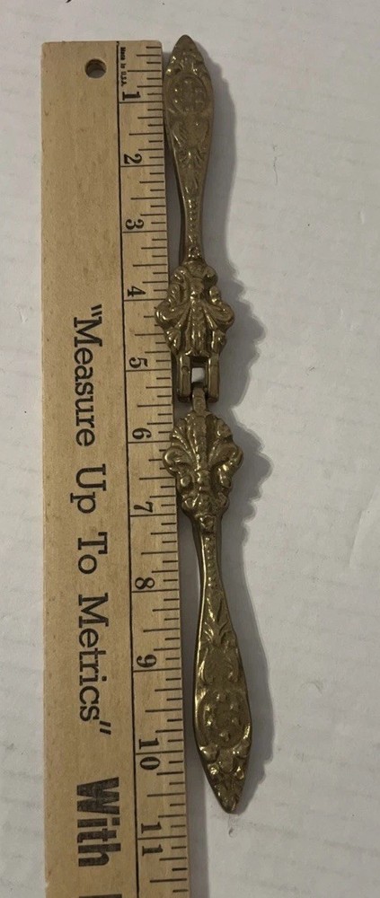 Vintage Brass Embossed Floral Ornate Nutcracker With Fleur De Lis Design