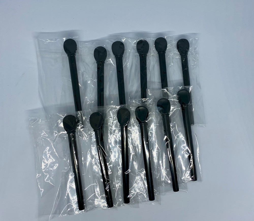 SET OF TWELVE EBONY LUTE PEGS