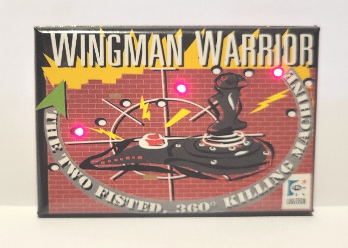 Logitech Wingman Warrior Pinback Button with blinking red lights CES promo