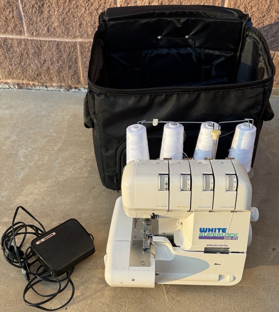 White Superlock Electronic 2000 ATS Serger w/ Rolling Case