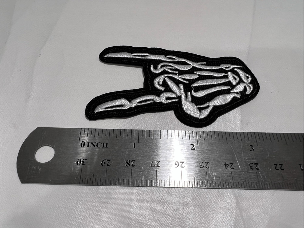 Skelton Hand Showing Horns Iron on Patch
