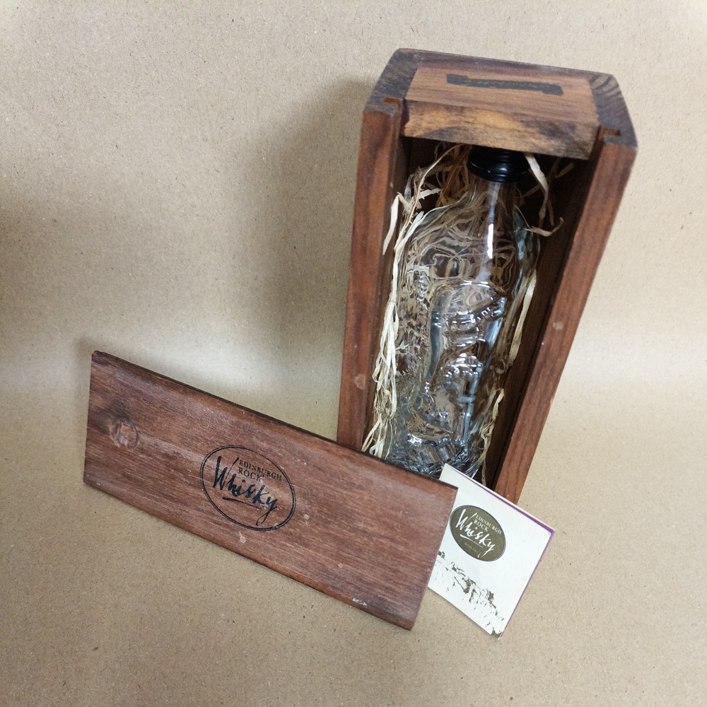 Collectable Edinburgh Rock Whisky bottle and presentation box 10cl. EMPTY.