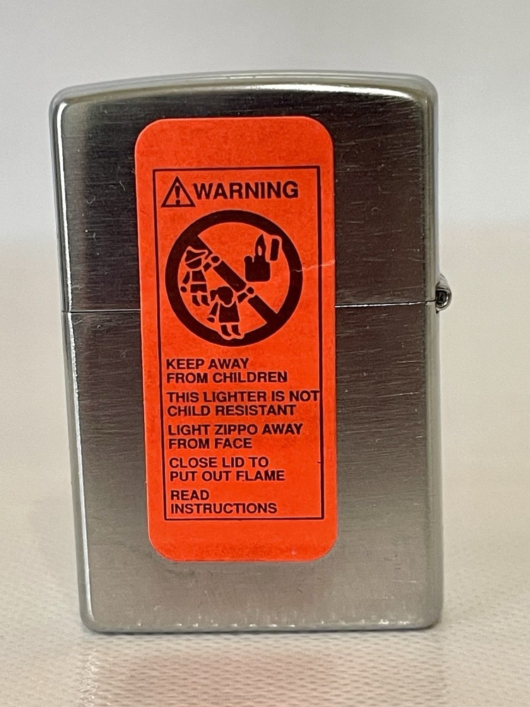 2002 Zippo Lighter engraved “OJIBWAS.COM”