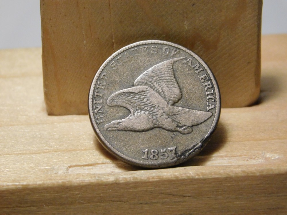 1857 U.S. Flying Eagle cent, lamination error at edge