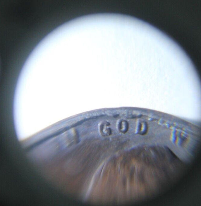 1937 penny with rim errors on front of coin