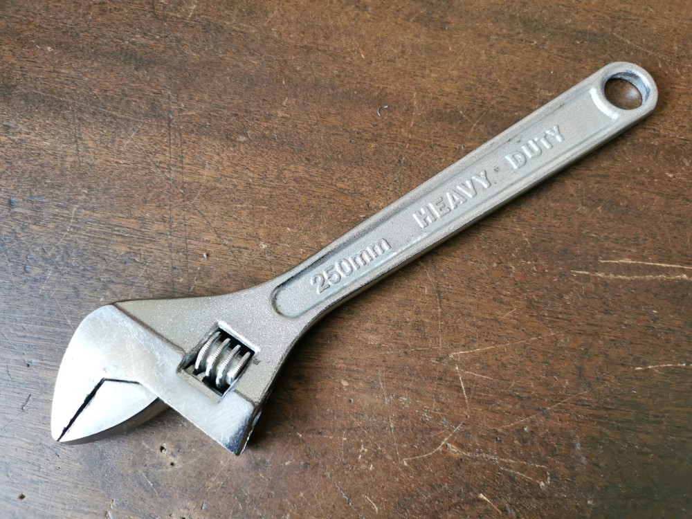 Modern 10" Adjustable Spanner to clear, no makers name.