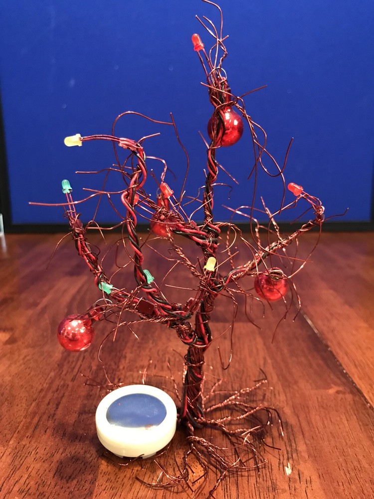Twisted Red Wire Christmas Tree Plays Music