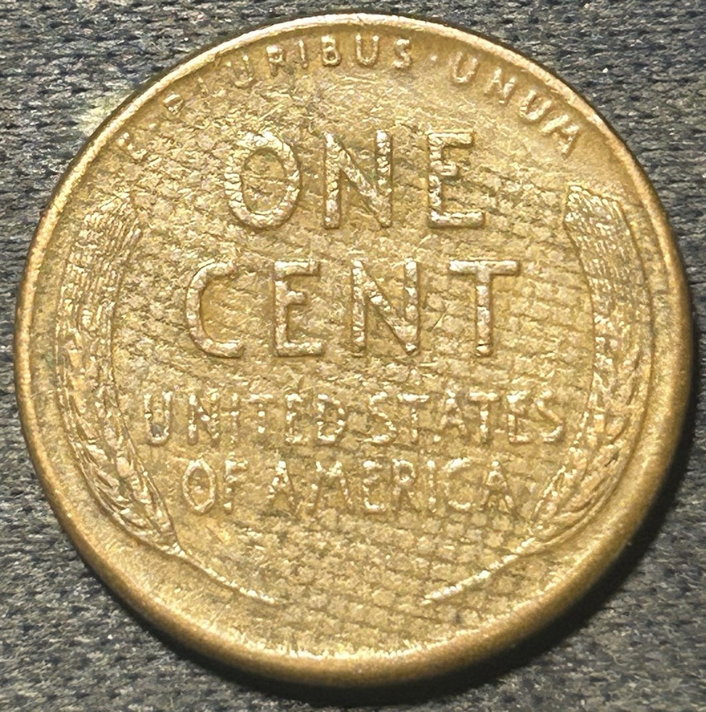 1945-P Lincoln Penny Struck Though Cloth