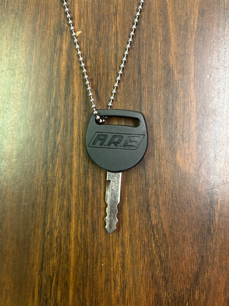 A.R.E. Truck Cap Key #0009