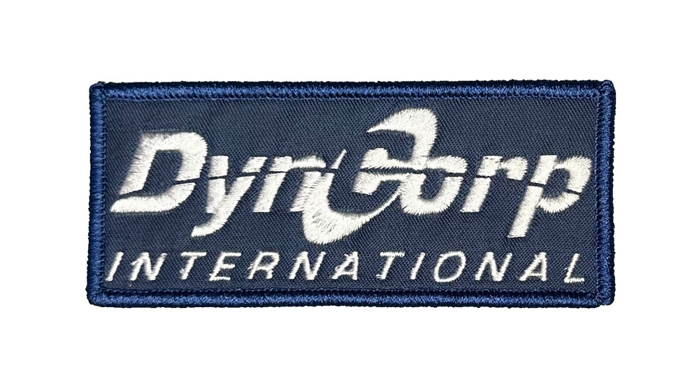 DYNCORP INTERNATIONAL EMBROIDERED IRON-ON PATCH...