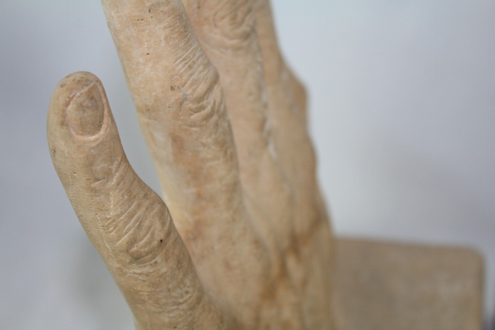 Plaster bookends Reading Hands