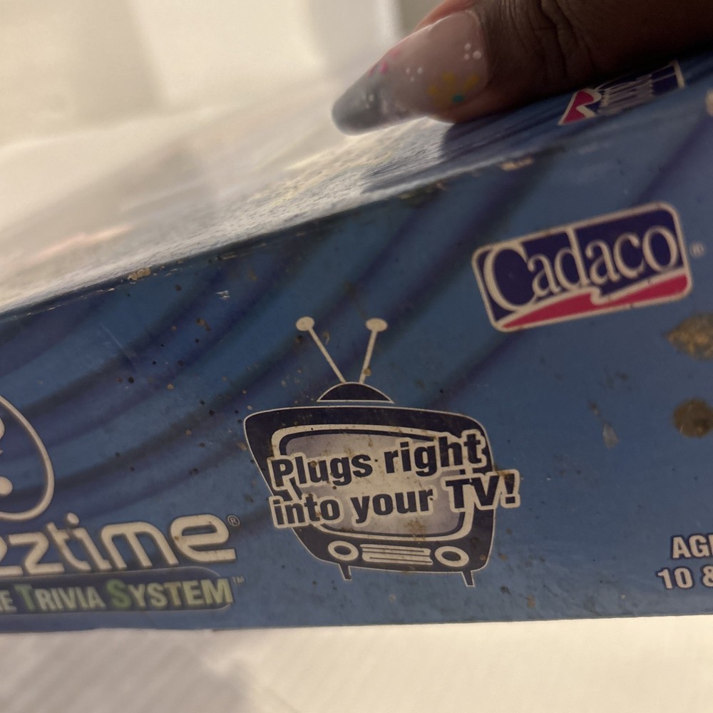 Buzztume Trivia System IncludesConsole,￼750 Trivia Questions ,Two Controllers