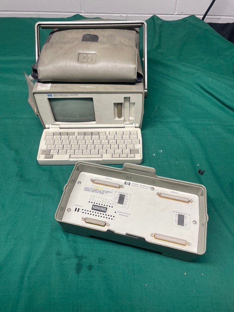 Hewlett Packard HP 4951A protocol analyzer with accessories 18180A interface