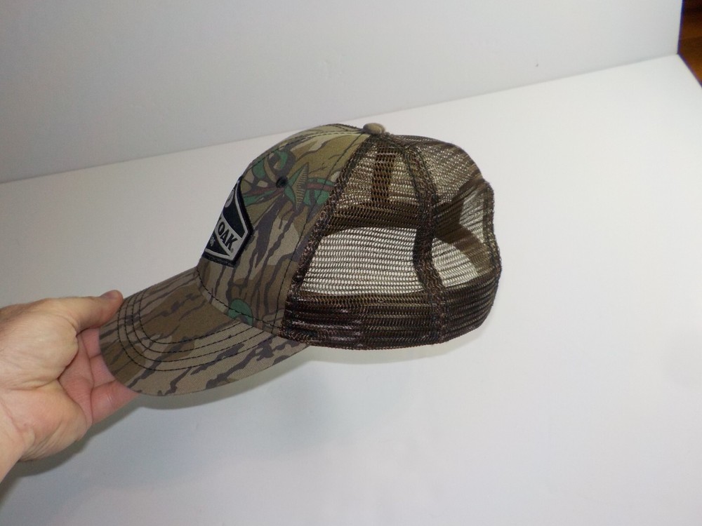 The Paramount Outdoors Mossy Oak Diamond Patch Cap Mesh Snapback Trucker Hat