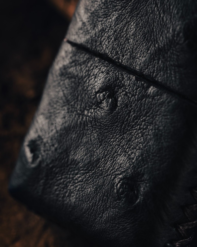 Custom wrapped Zippo lighter in black Ostrich hide.