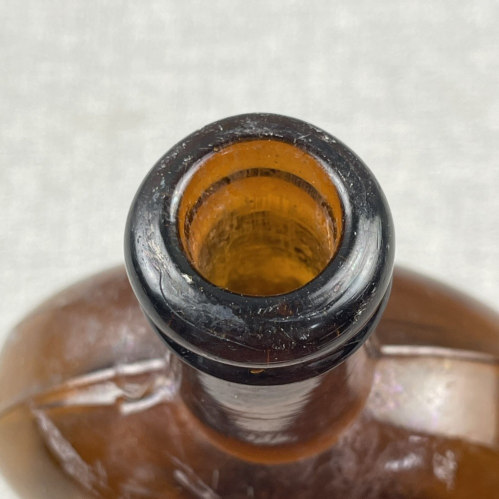 Amber Strap Side Whiskey Flask "194" Embossed Base