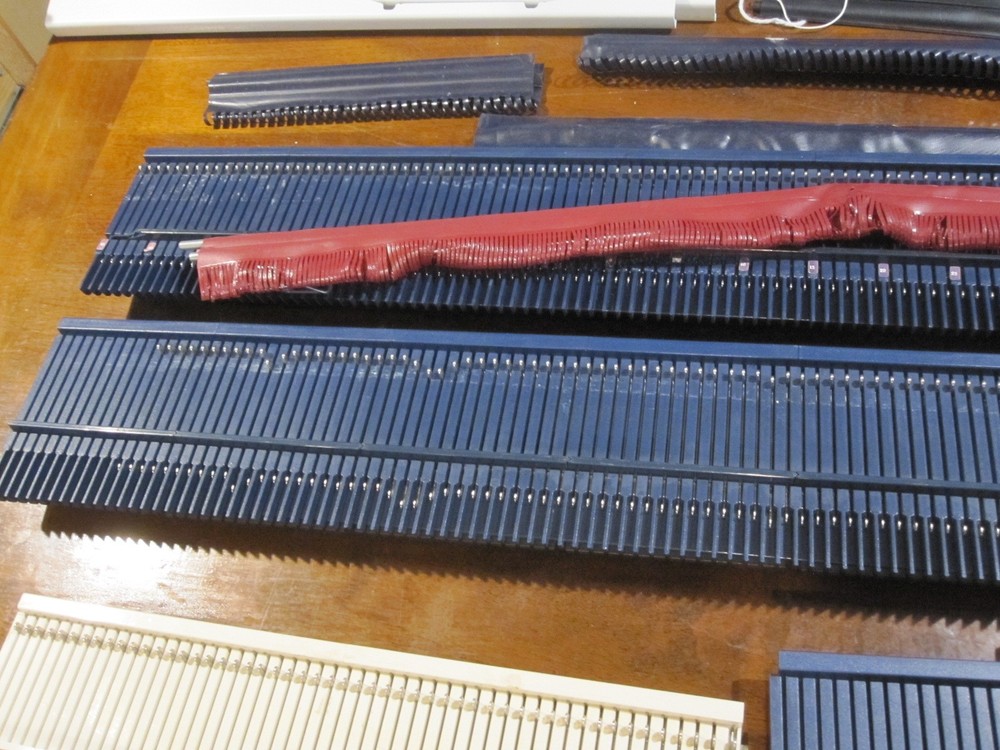 Bond Knitting Machine Two Beds Plus Extensions, Cast on Combs, some Accessories.