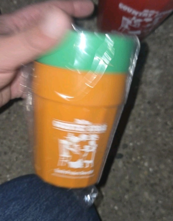 McNess Country Store. Plastic Pitcher And 4 Plastic Cups