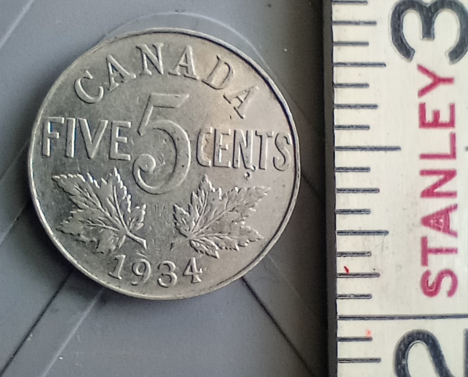 1934 Canada 5 Cent Coin. Very nice condition.