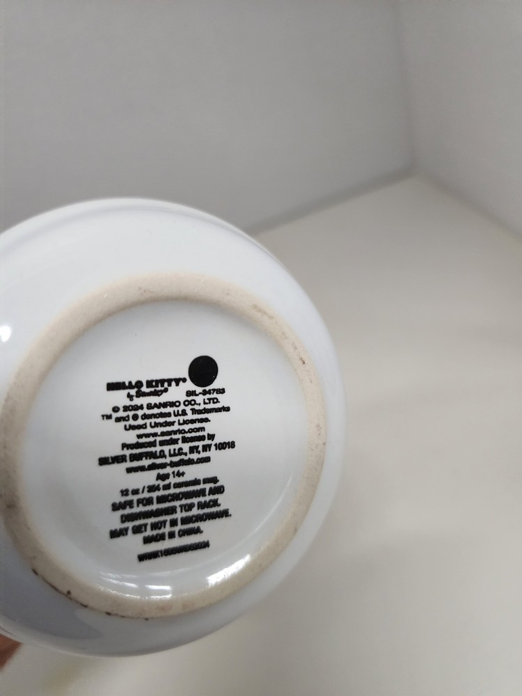 Ceramic Mug Is A Hello Kitty Themed Drinkware Item Pink White