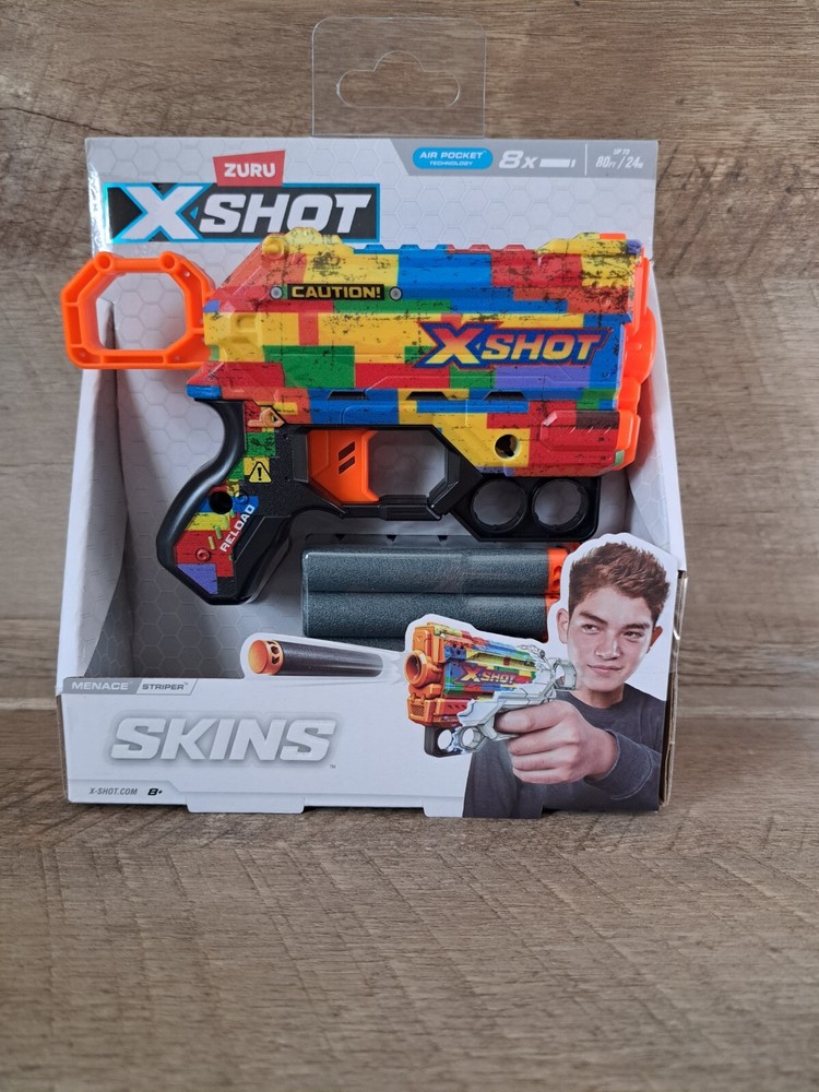 X-Shot SKINS Stripper  Blaster  includes 8 Bullets