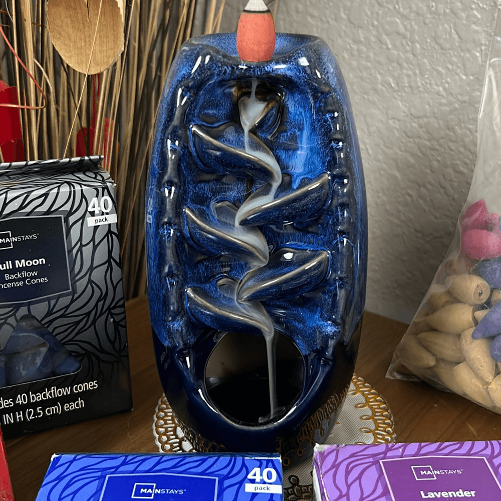 Incense burner with five packages of incense