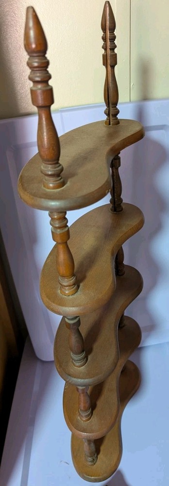 vintage wood spindle shelf or possibly spiral library steps.
