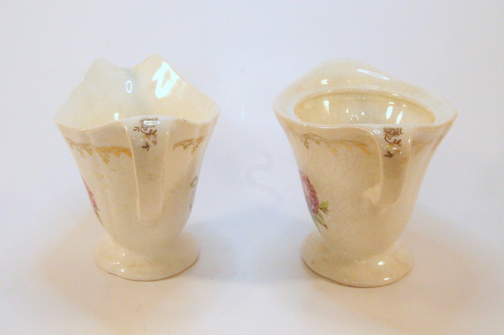 Creamer and sugar with rose and shell pattern with gold detailing