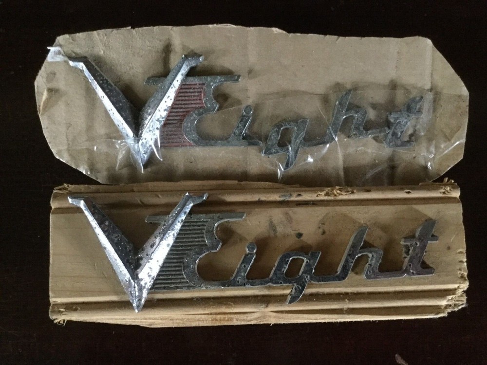 1953 1954 Dodge V Eight Trunk Badge pair one solid one pieces complete
