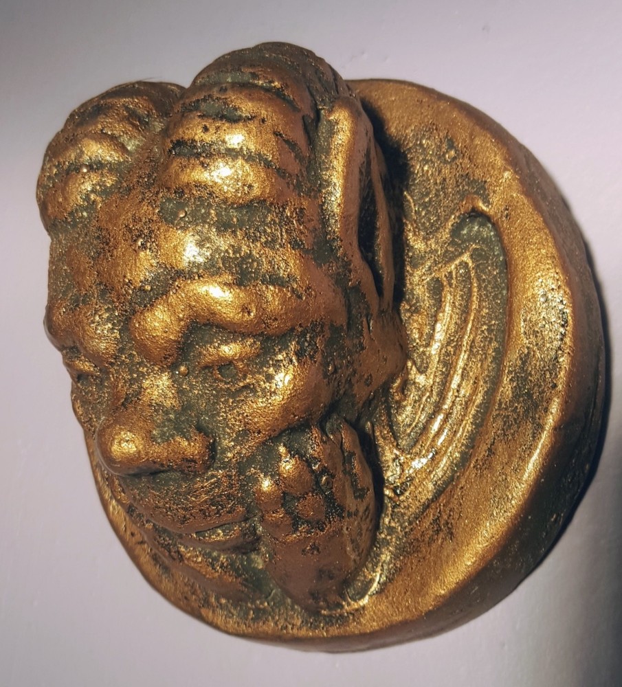 Gargoyle mythical round protector with horn face wall plaque bronze color