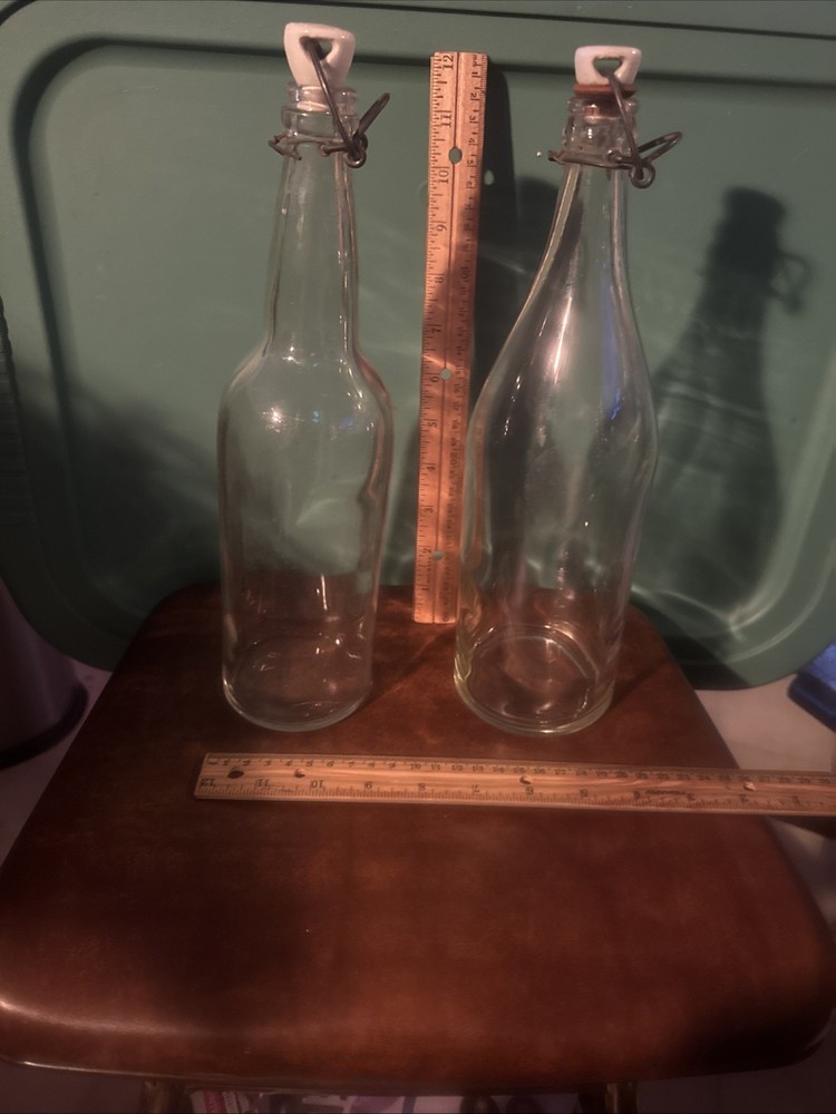 Two Swing Top Ez Cap Bottles White Porcelain Stoppers Clear Bottles. Not Same
